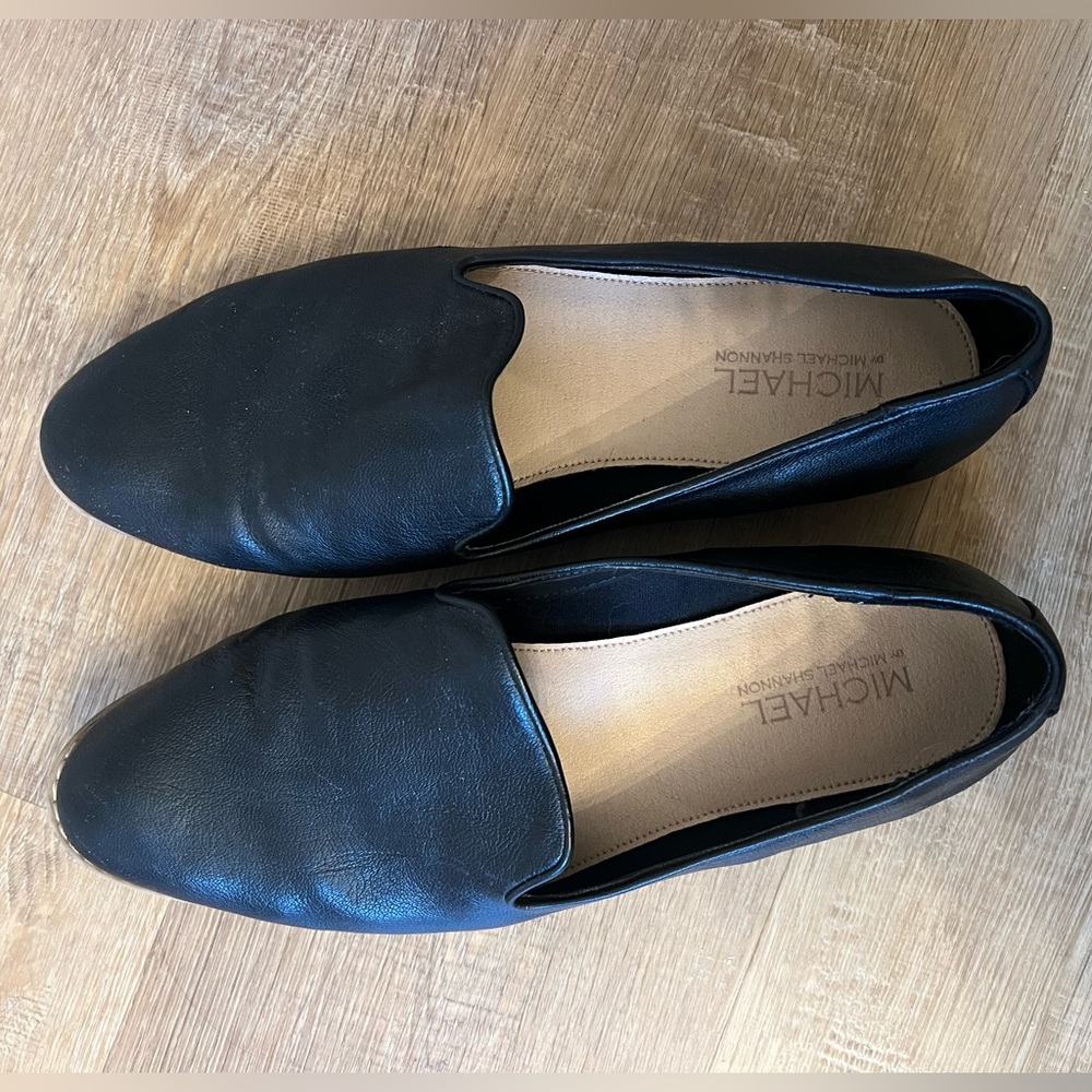Black leather flats
